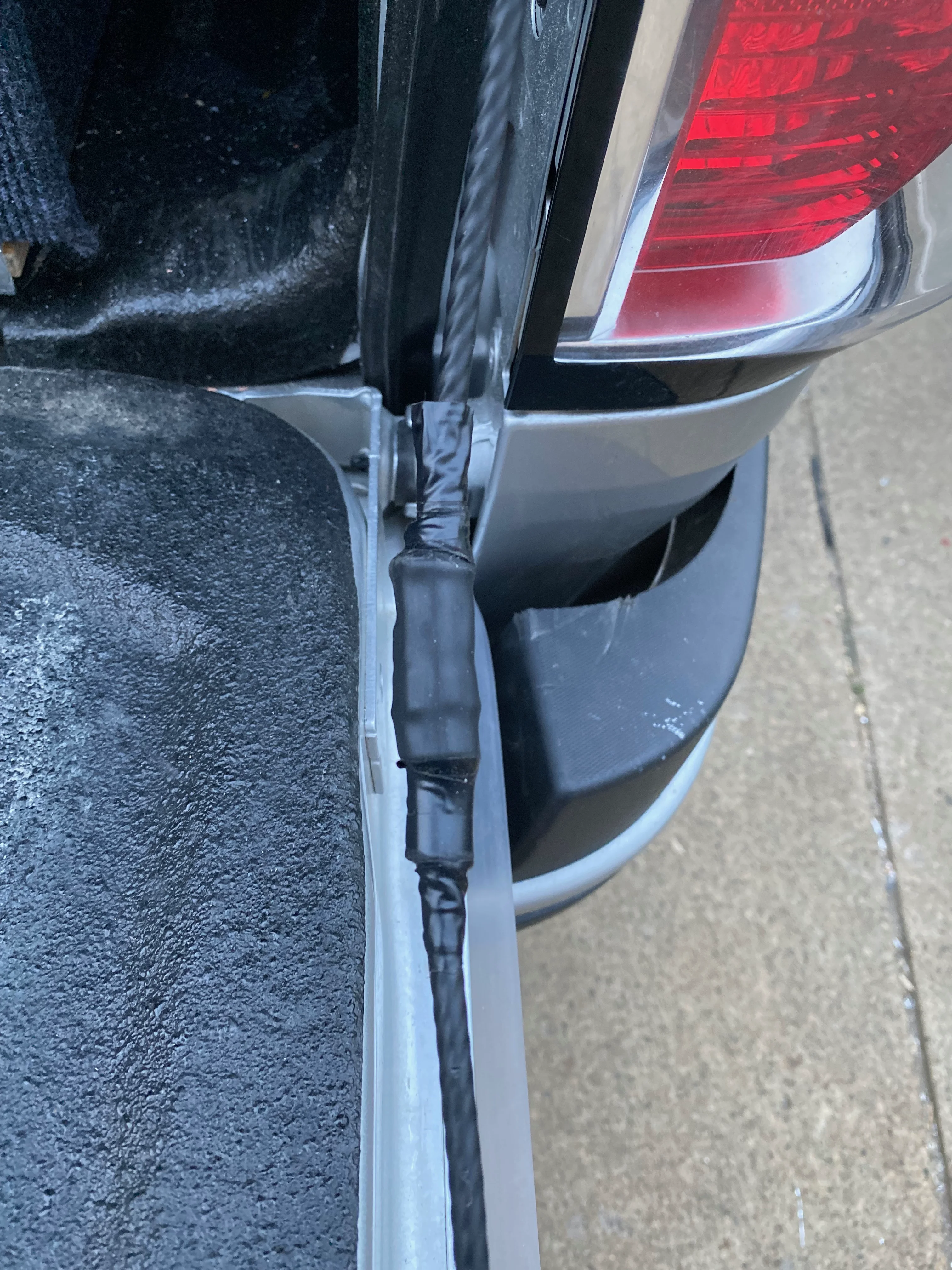 Heat shrink tubing over cable crimp with temporary electrical tape